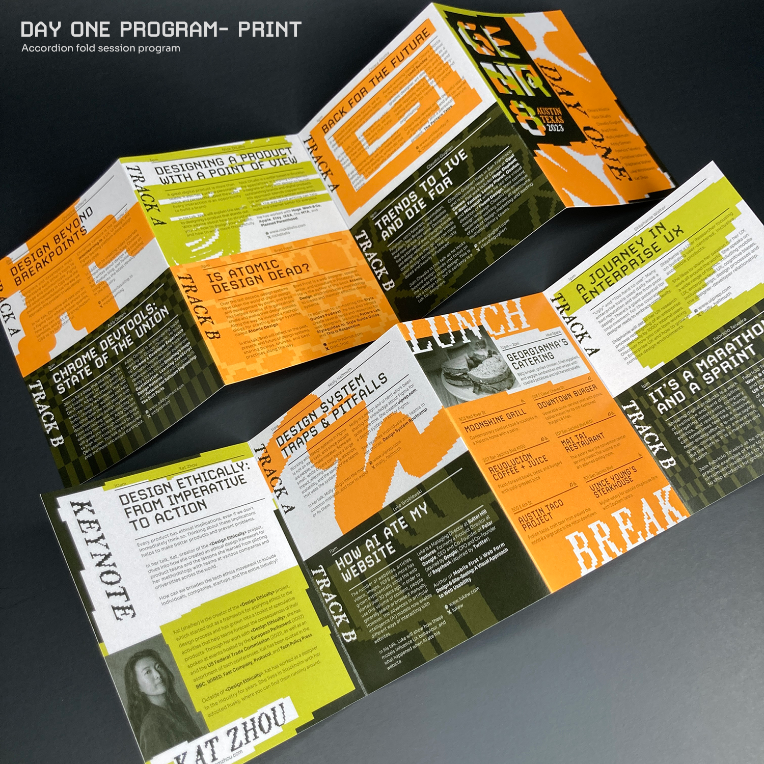 Day One Program- print example, front and back (both sides), on a black backdrop